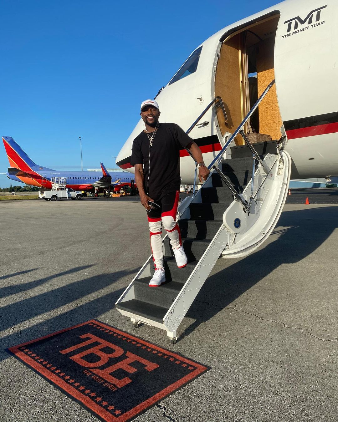 Floyd Mayweather's custom private jet worth $50 million with his name on it, masseuse, TVs and luxury seats.