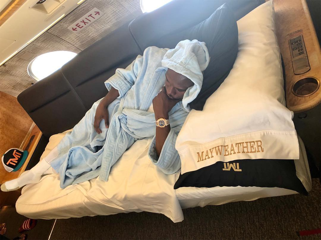 Floyd Mayweather's custom private jet worth $50 million with his name on it, masseuse, TVs and luxury seats.