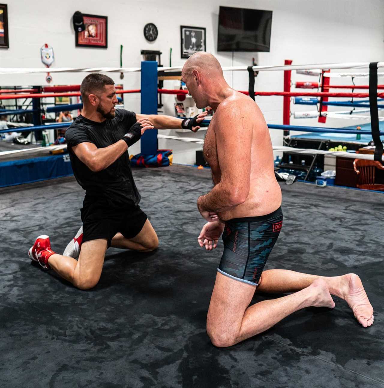 After hinting at MMA switching in throwback snaps, Tyson Fury trains alongside UFC star Nick Diaz.