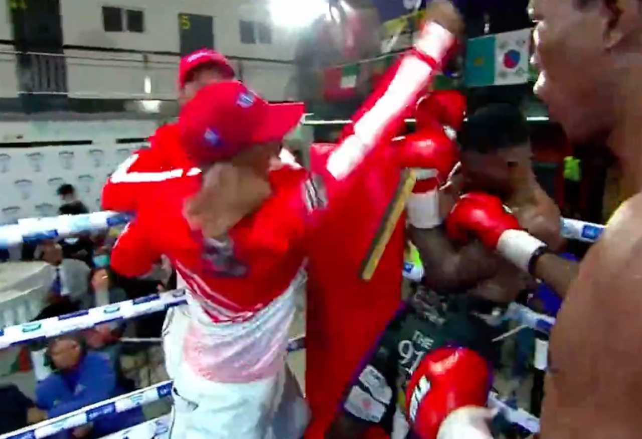 Watch shocking moment boxer’s trainer enters ring after final bell and ATTACKS triumphant opponent