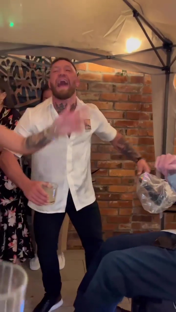 Conor McGregor party in the smoking area at his Black Forge Inn, as UFC star dances with whiskey before returning