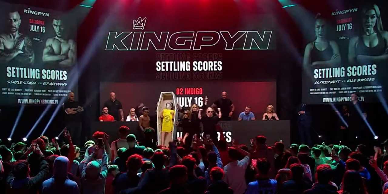 Astrid Wett and Elle Brooke, models for OnlyFans, trade blows in advance of a boxing fight. Brooke mocks her rival with COFFIN