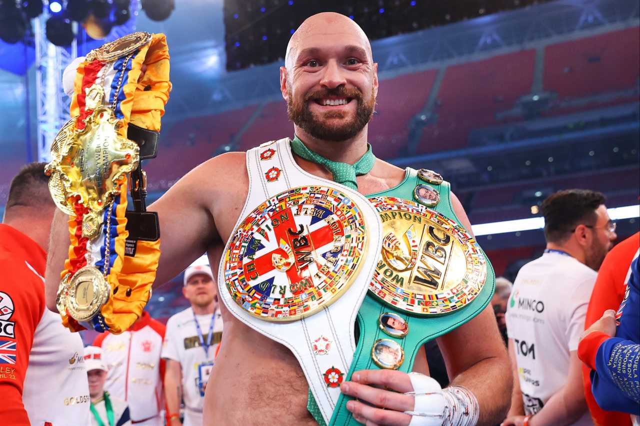 Tyson Fury is forced to shoo off a fan who attempted to take a selfie with the heavyweight boxing champ