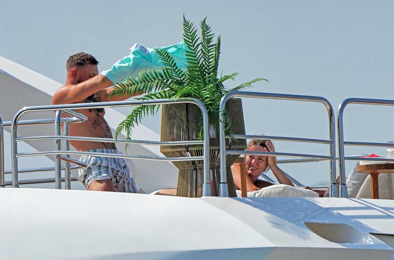 Conor McGregor and Dee Devlin get frisky on superyacht, as the couple make fun of each other with onlookers