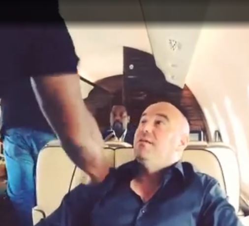 Watch Mike Tyson punch Dana White, UFC boss, and kick him out of a private jet seat. Then write 'd ***' to his head as a prank.