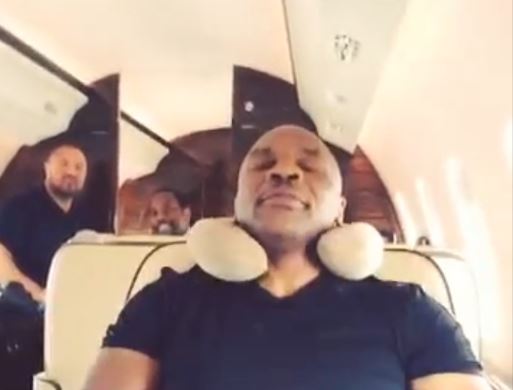 Watch Mike Tyson punch Dana White, UFC boss, and kick him out of a private jet seat. Then write 'd ***' to his head as a prank.
