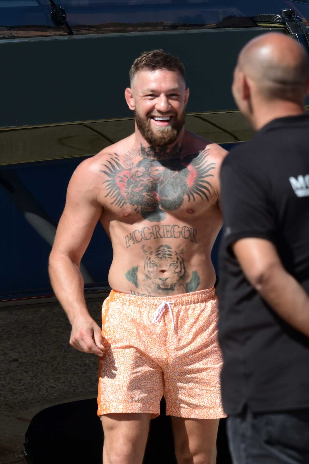 Conor McGregor takes Dee Devlin on a spin as he drives his PS2.7m Lamborghini Yacht across the south coast of France.