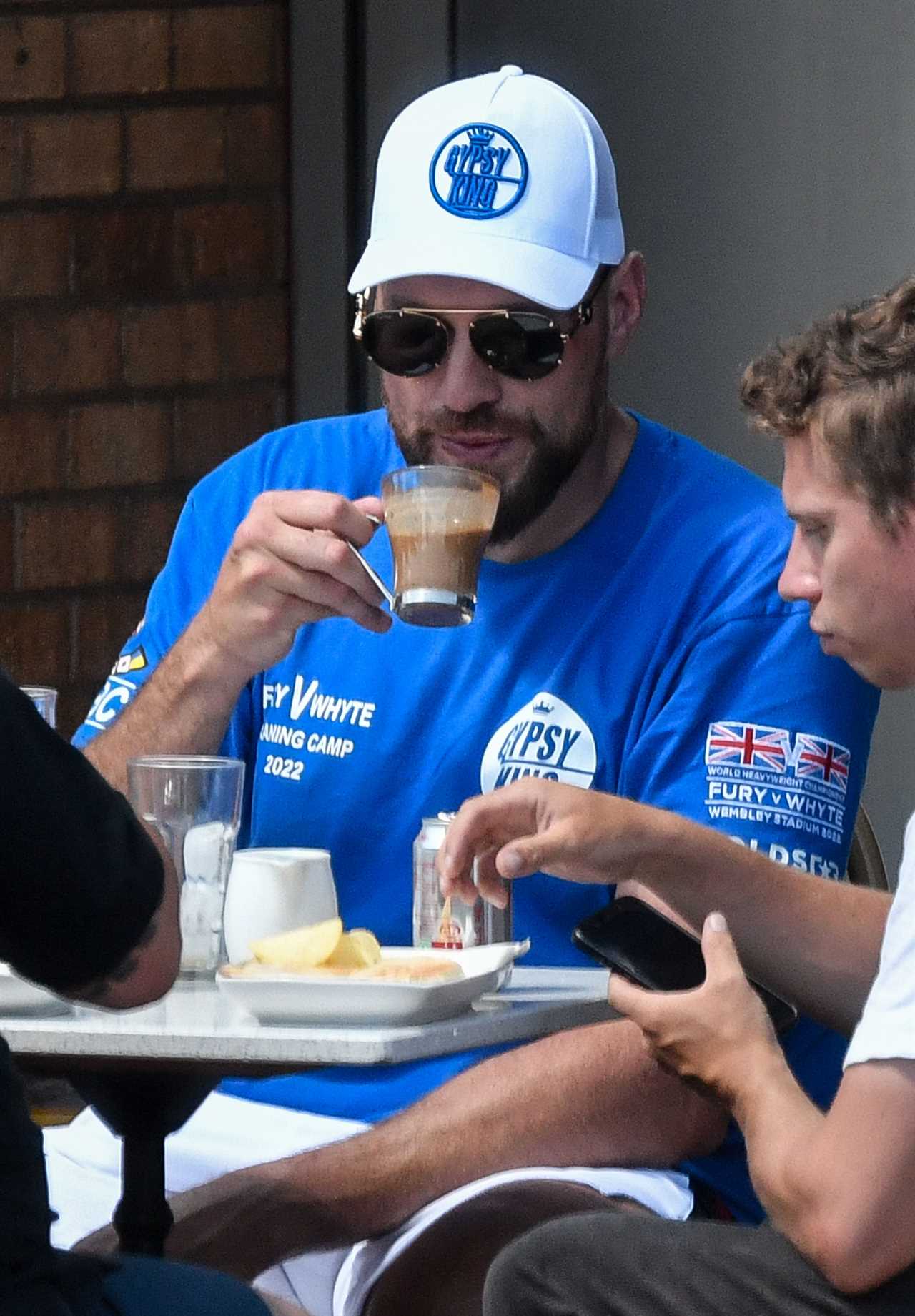 Tyson Fury eats lunch after a day of filming, before getting into a PS250k Ferrari amid talk about a return to boxing
