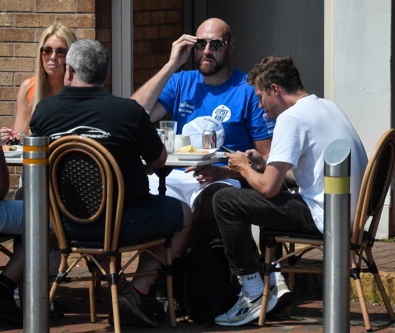 Tyson Fury eats lunch after a day of filming, before getting into a PS250k Ferrari amid talk about a return to boxing