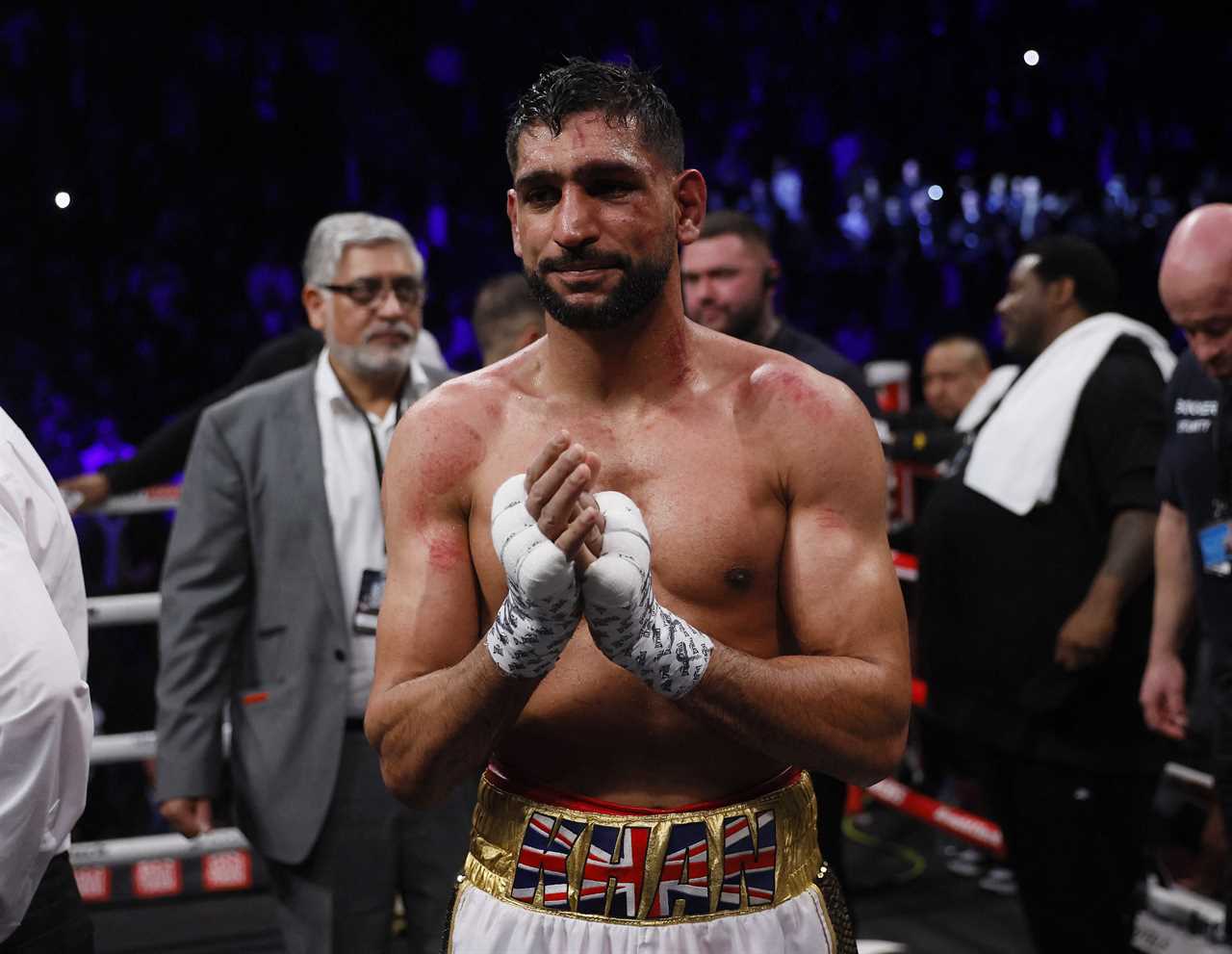 Three men were arrested after Amir Khan, a boxer, robbed him at gunpoint in east London for a PS72k watch