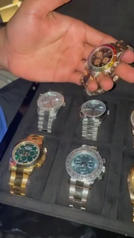 Amir Khan displays his luxury watch collection hours after three men were arrested for stealing his PS72k timepiece