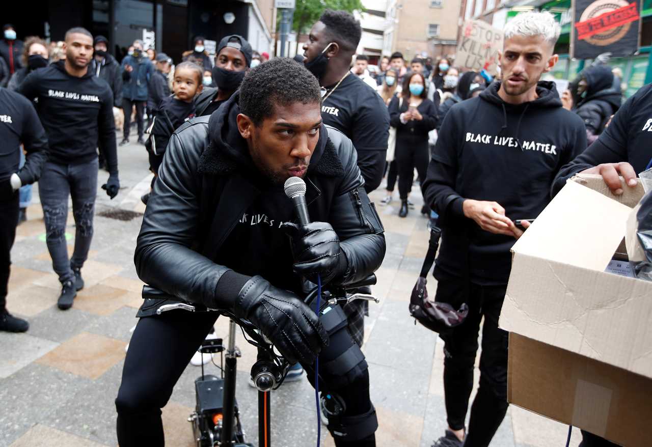 Anthony Joshua enters Lewis Hamilton's racism row and shares that he experienced similar 'upsetting abuse' as a child.