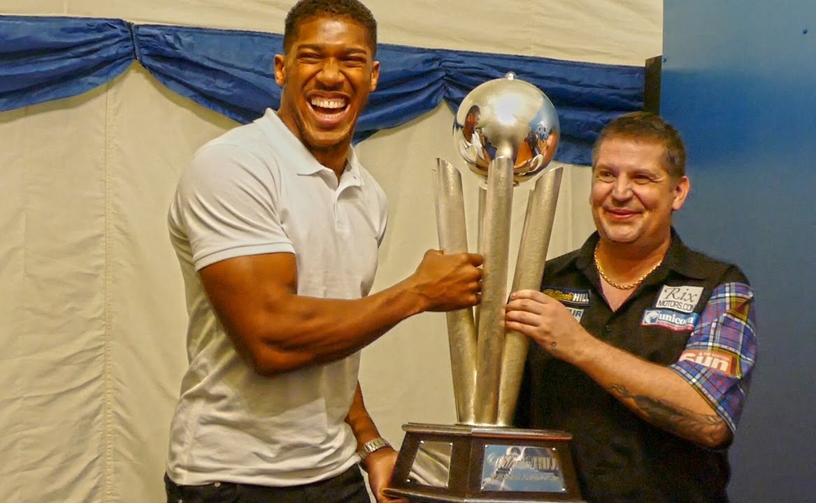 Anthony Joshua says he would like to be a professional DARTS player, even if he was not in boxing. He also reveals what the ultimate cheat meal is.