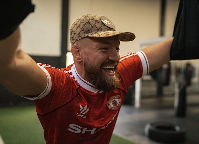 Conor McGregor, UFC champ, compares his garden with Phoenix Park while he rides in pictures with his children.