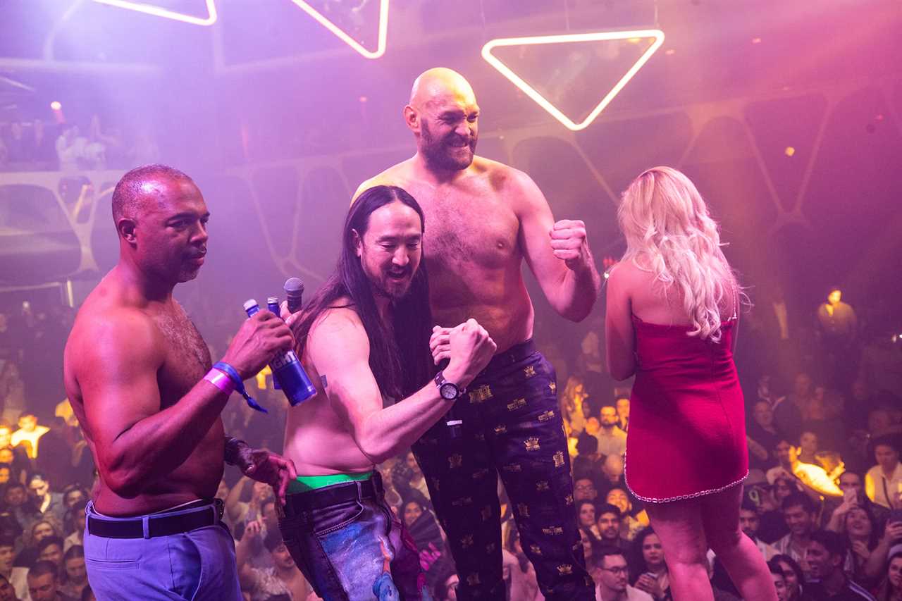 Tyson Fury is topless in PUB while Brit chats with locals and poses to photos while out on the town in Liverpool