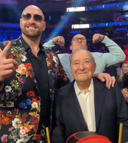 Watch moment Tyson Fury photobombed by undisputed heavyweight title rival Oleksandr Usyk before the pair embrace