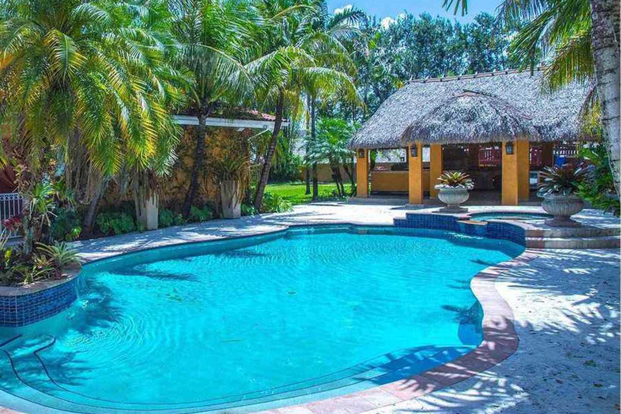 Jorge Masvidal, UFC fighter, owns a stunning PS1.6m Miami home that was inspired by Scarface. It features a Koi pond and marble floors.