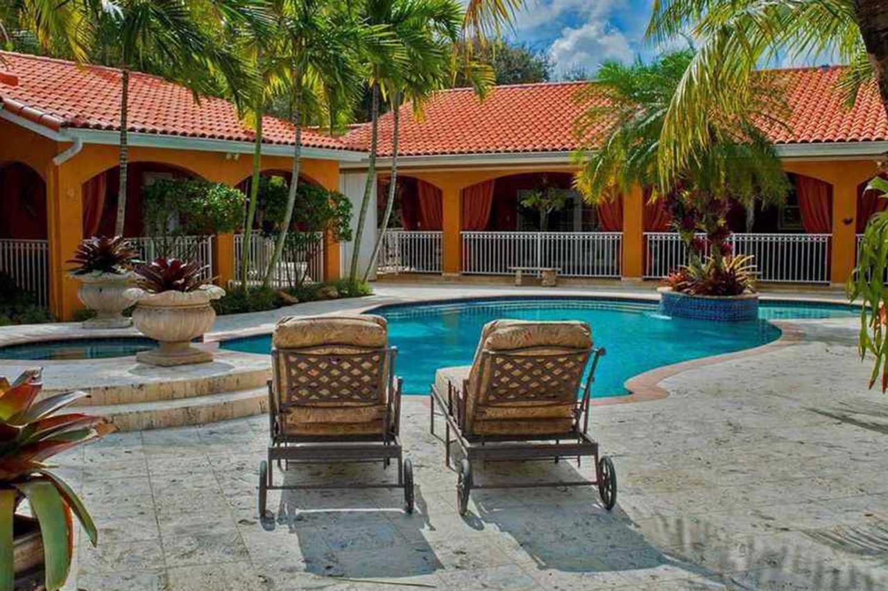 Jorge Masvidal, UFC fighter, owns a stunning PS1.6m Miami home that was inspired by Scarface. It features a Koi pond and marble floors.