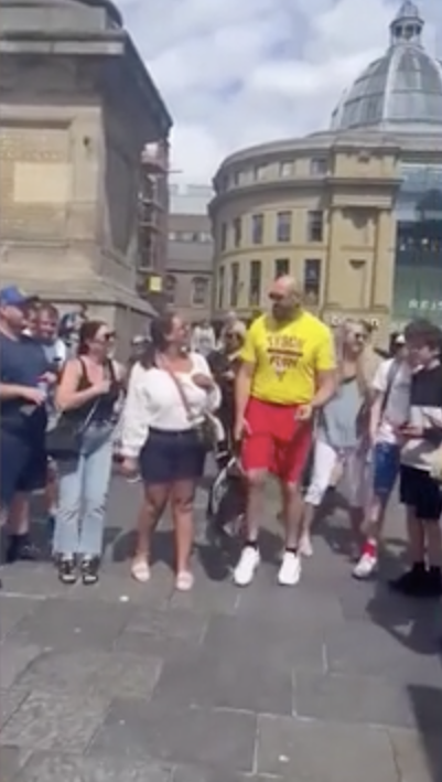 He was dressed as a lifeguard - Tyson Fury surprises buskers singing and dancing on the streets of London during his retired boxer tour.