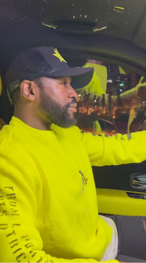 Must Be Jake Paul - Floyd Mayweather cruises with his fans in bright yellow car and matching outfit while he plays his music.