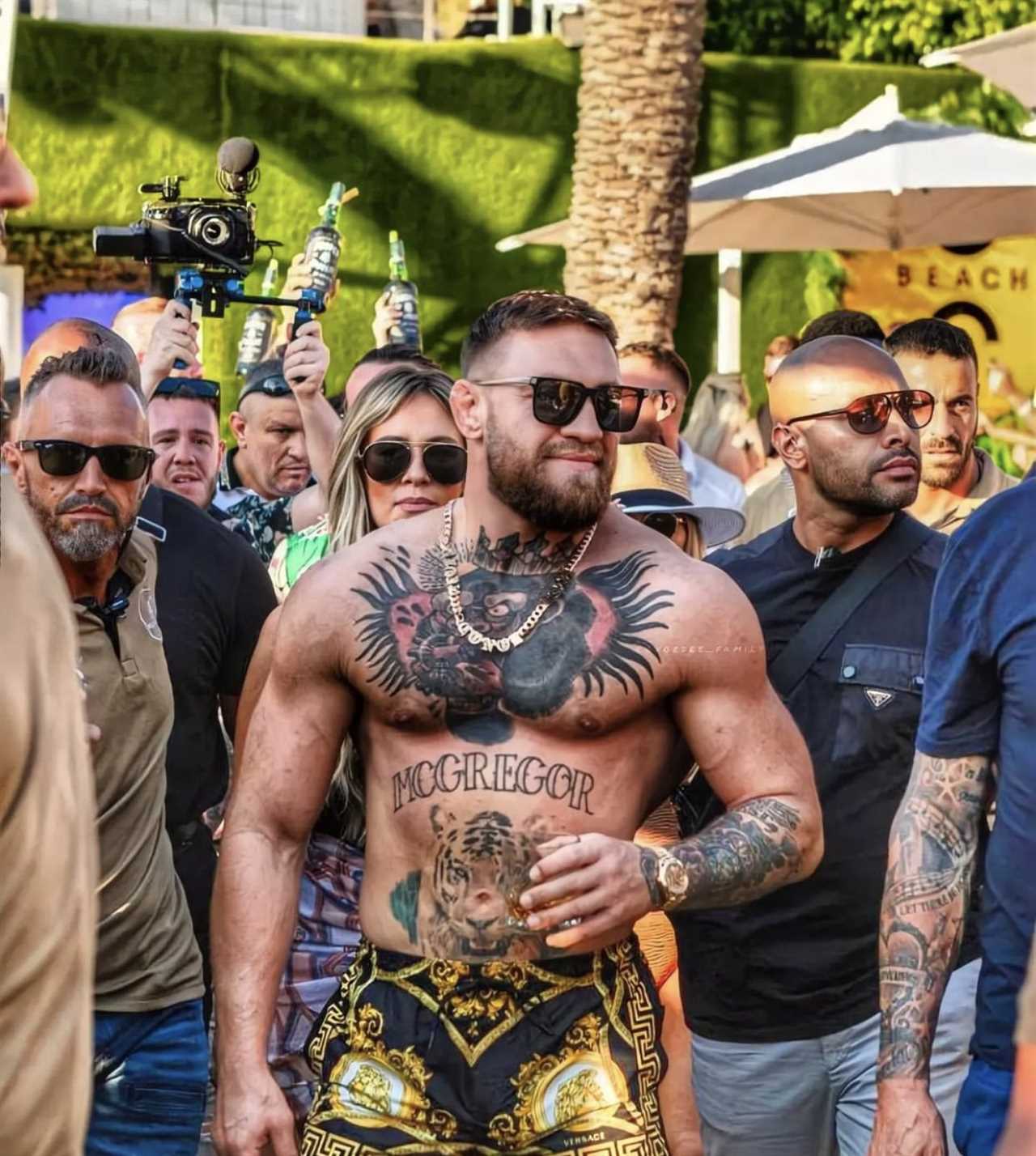 Topless Conor McGregor celebrates his birthday with Gary Lineker's brother Wayne at UFC's wild celebrations in Ibiza