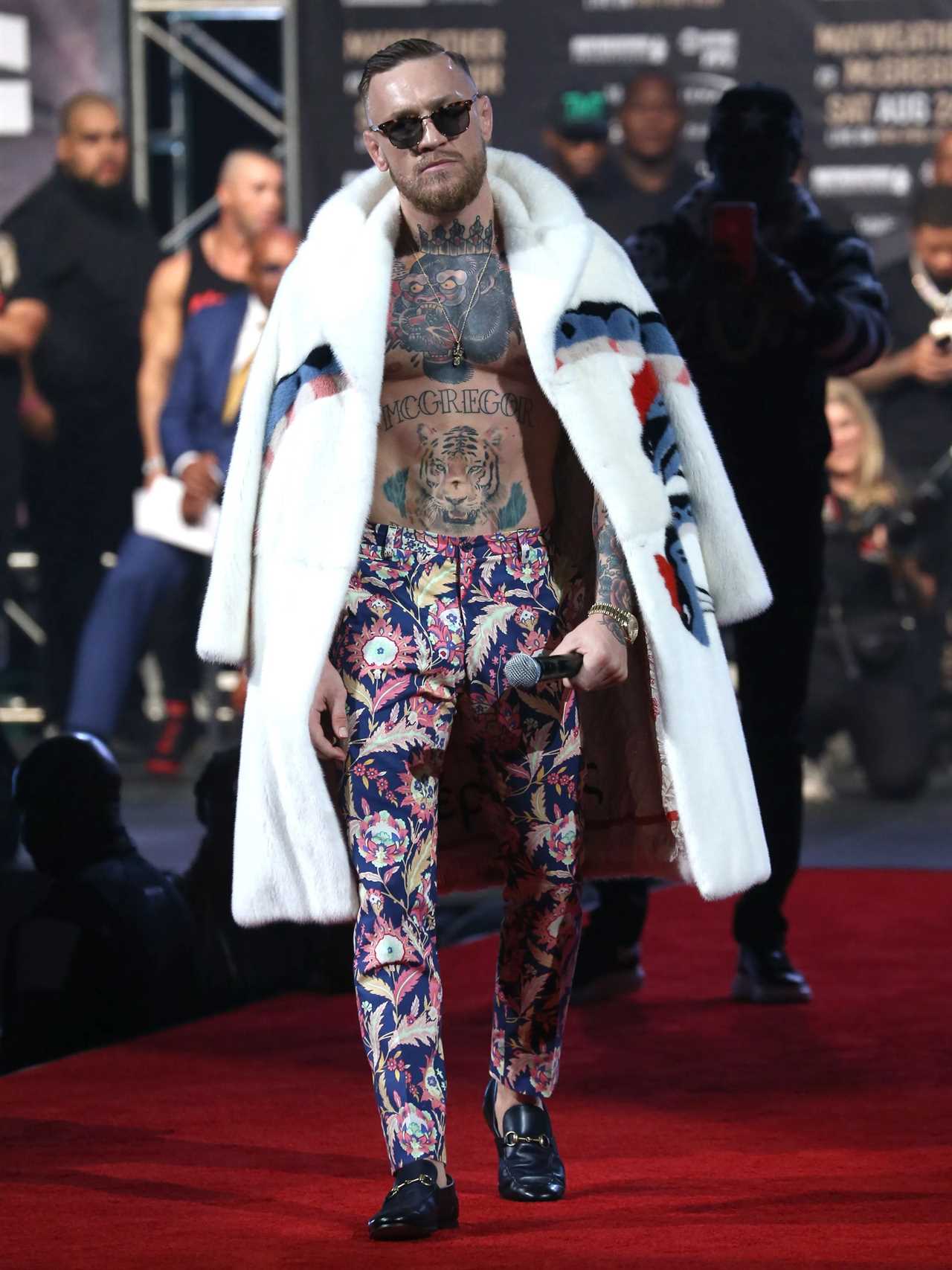 Conor McGregor and Floyd Mayweather's feud: 'f ***'you' suits, shocking trash talk ahead to boxing sequel