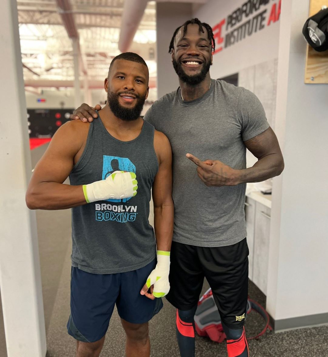 Deontay Wilder, a fellow heavyweight boxer, poses with Michael Hunter in front of his return to the ring.