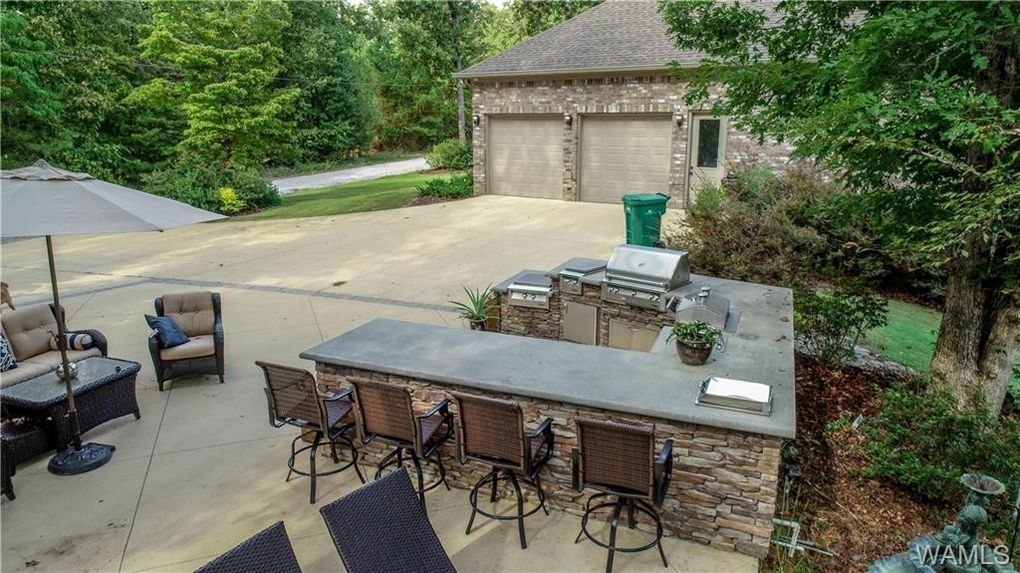 The outside kitchen is perfect for a BBQ