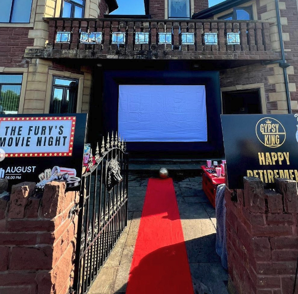 Tyson Fury's movie-night-themed birthday and retirement party featuring giant screen, red carpet, and popcorn machine