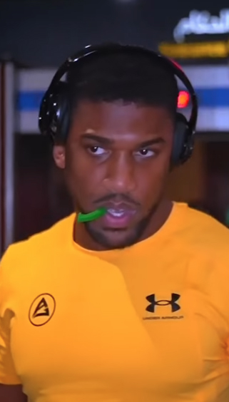 Fans are all saying the exact same thing about Joshua chewing a mystery green object prior to Usyk fight...and that could be a bad sign.