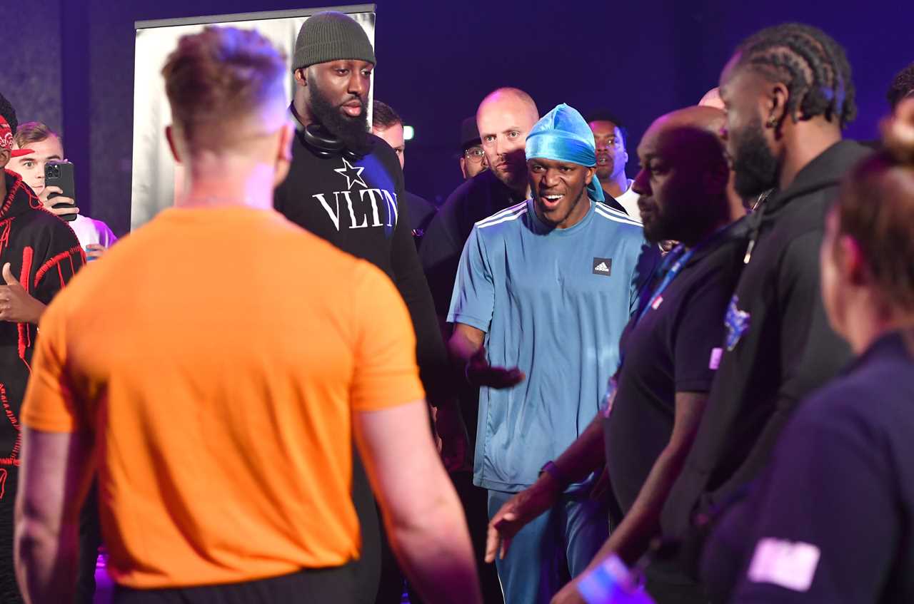 Joe Weller and KSI almost exchange punches in a fiery face-off, before security intervenes as a YouTuber calls out for'street fighting'