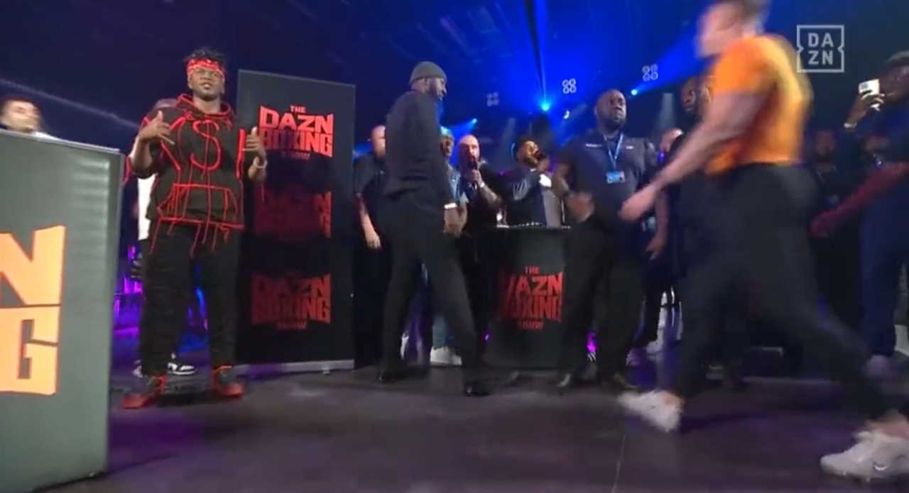 Joe Weller and KSI almost exchange punches in a fiery face-off, before security intervenes as a YouTuber calls out for'street fighting'