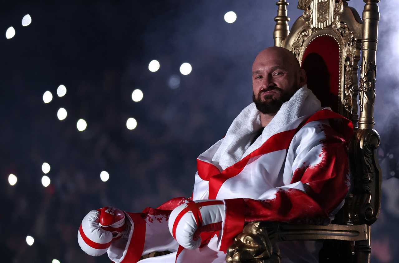 Tyson Fury relaxes on gold THRONE at his home, after receiving a prop from Deontay wilder fight