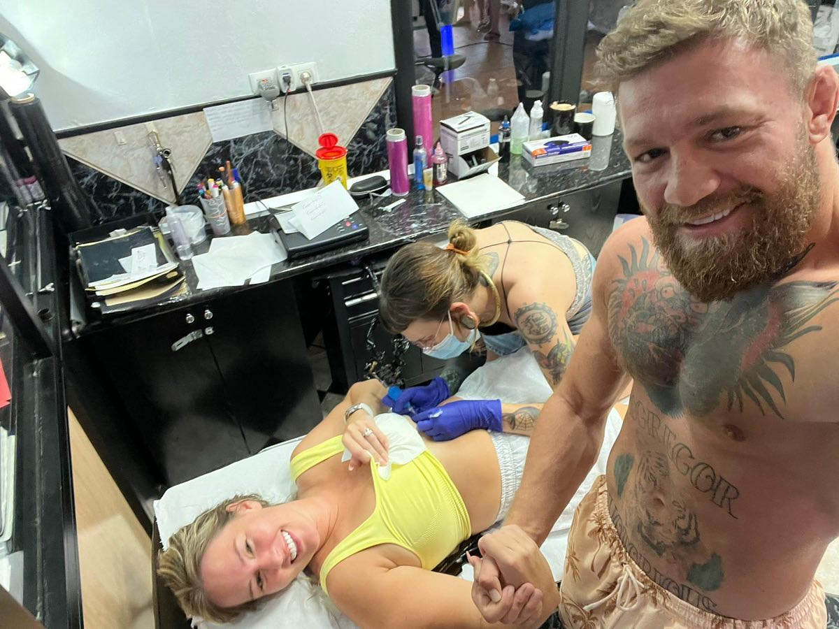 Dee Devlin shows off her Conor McGregor tattoo in bikini as UFC star partner.
