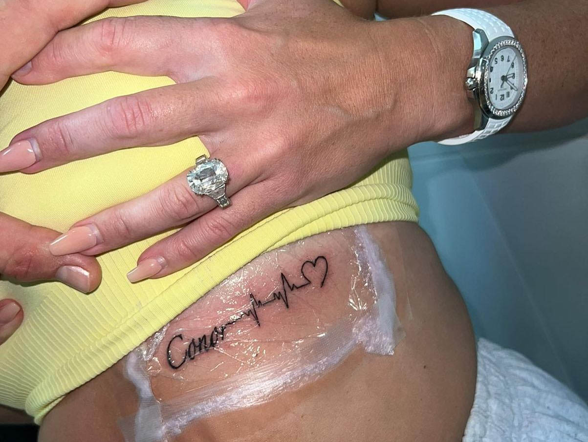 Dee Devlin shows off her Conor McGregor tattoo in bikini as UFC star partner.