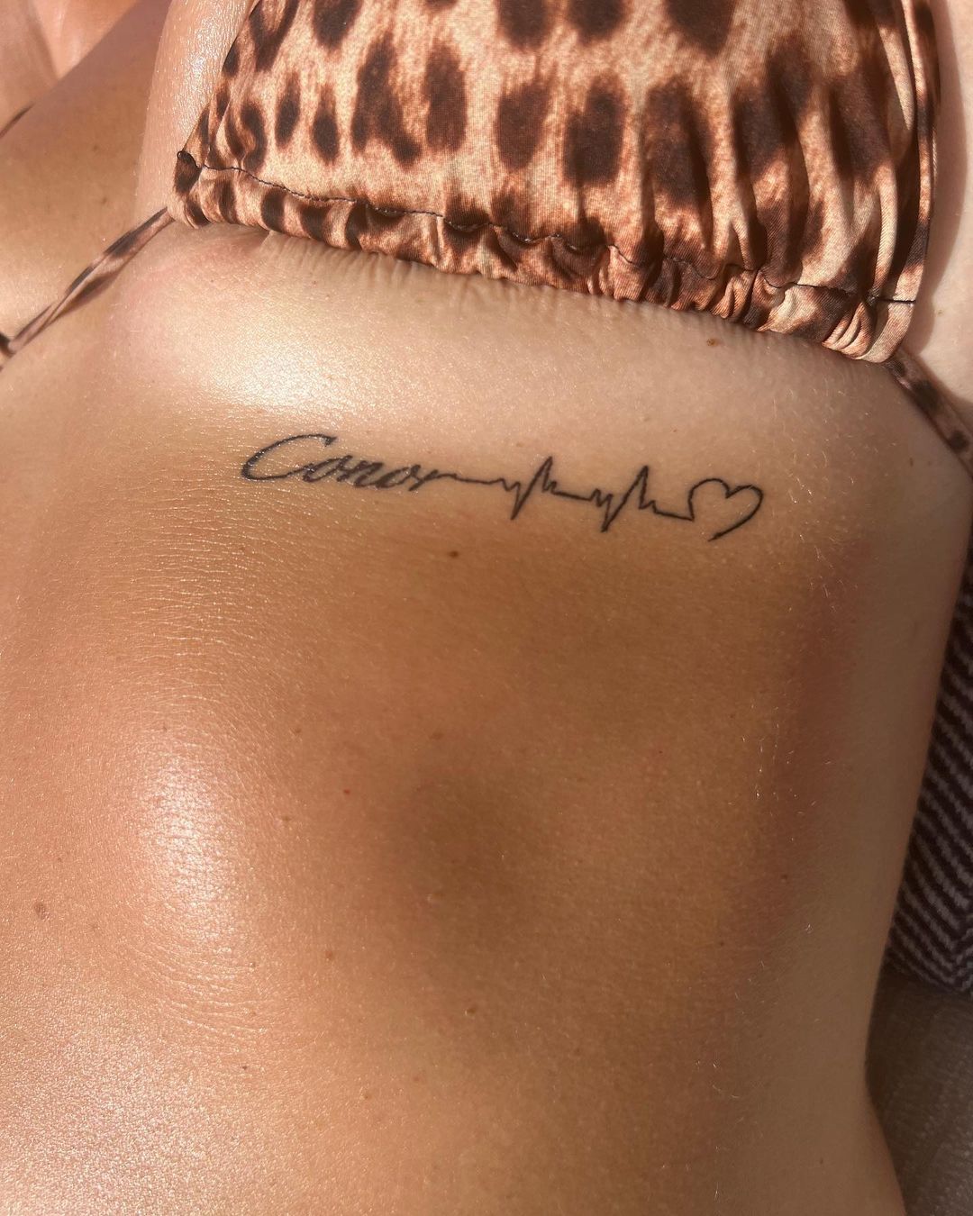 Dee Devlin shows off her Conor McGregor tattoo in bikini as UFC star partner.