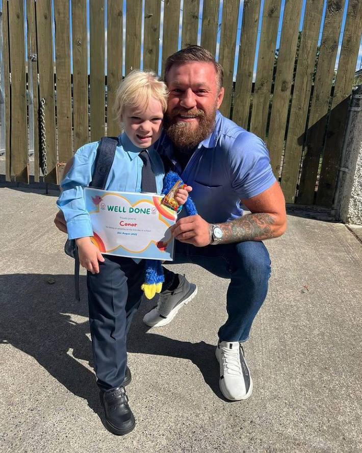 UFC stars Conor McGregor & Dee Devlin are over the moon as Conor Jr finishes his first day at school