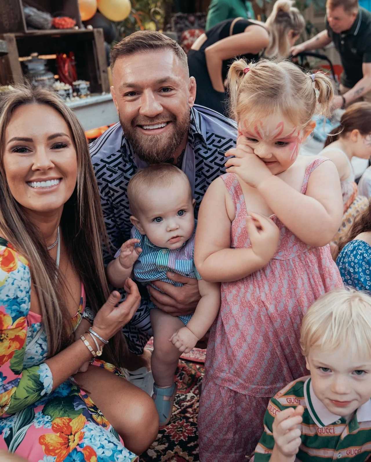 UFC stars Conor McGregor & Dee Devlin are over the moon as Conor Jr finishes his first day at school
