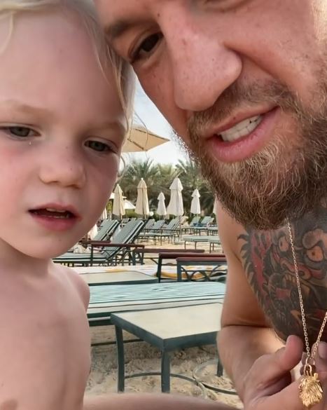 UFC stars Conor McGregor & Dee Devlin are over the moon as Conor Jr finishes his first day at school