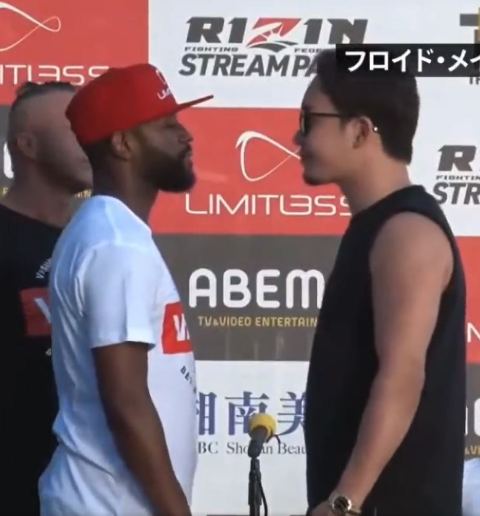 Watch Floyd Mayweather's bodyguard TURNS Mikuru Asakura AWAY FROM BOXER DURING FACE-OFF PRIOR TO FIGHT