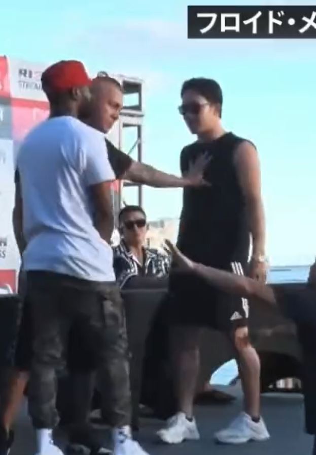 Watch Floyd Mayweather's bodyguard TURNS Mikuru Asakura AWAY FROM BOXER DURING FACE-OFF PRIOR TO FIGHT