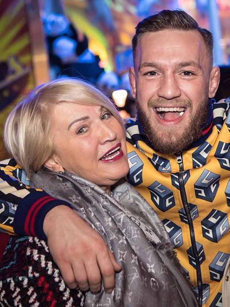 Conor McGregor shares a pic of Dan holding the UFC star's belt and pays tribute to him.