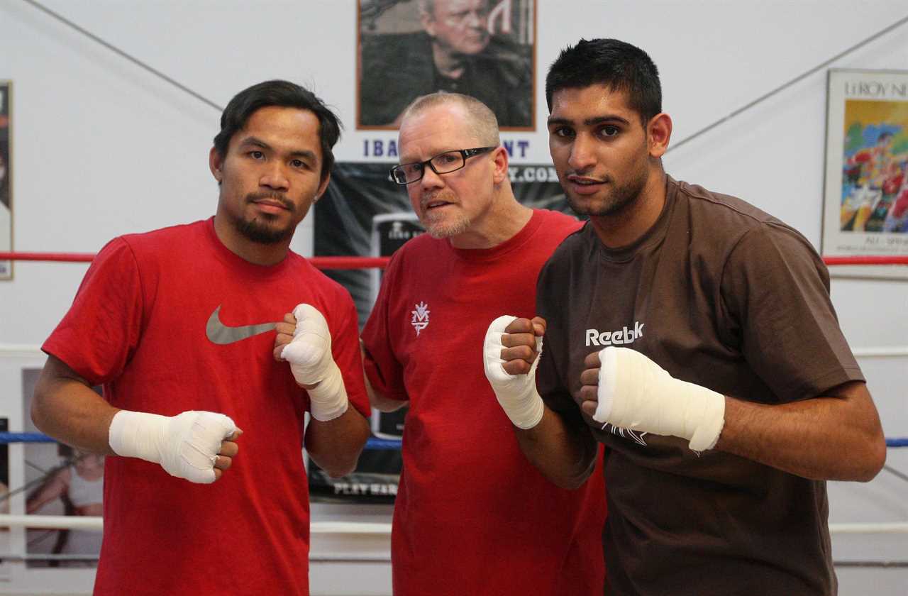Manny Pacquiao talks to Jaber Zayani, his former sparring partner in a Saudi Arabia exhibition bout.