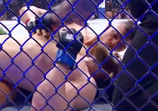 Johnny Walker kisses his KO opponent before he is THROWN AWAY from the arena at UFC 279 without shoes after winning fight