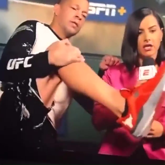 UFC star Nate Diaz shouts these f***ing sneakers SUCK in deleted footage. This is part of a new sponsorship deal with The Rock