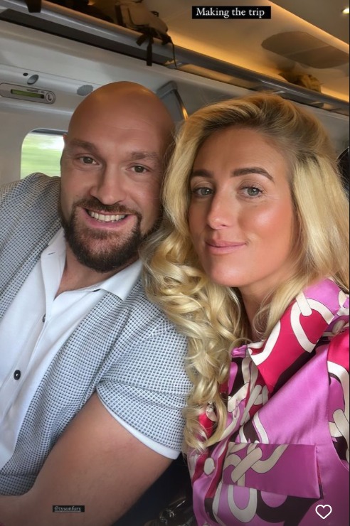 Paris and Tyson Fury pay sweet tribute to the Queen by placing flowers at Buckingham Palace's gates.