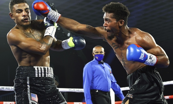 Isiah Jones, 28 years old, has died. Boxer was'shot in head' during an argument with a family member. Trainer confirms shock death.