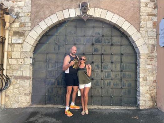 Tyson Fury and his wife Paris wear full Gypsy King costumes in Cannes as they go on a history walk and then relax at the beach.