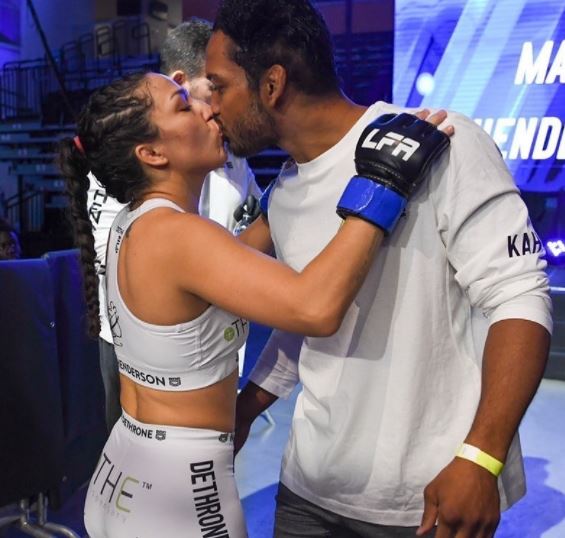 Bellator's Benson Henderson is a tough fighter in the cage, but he is super-dad with his MMA fighting wife Maria