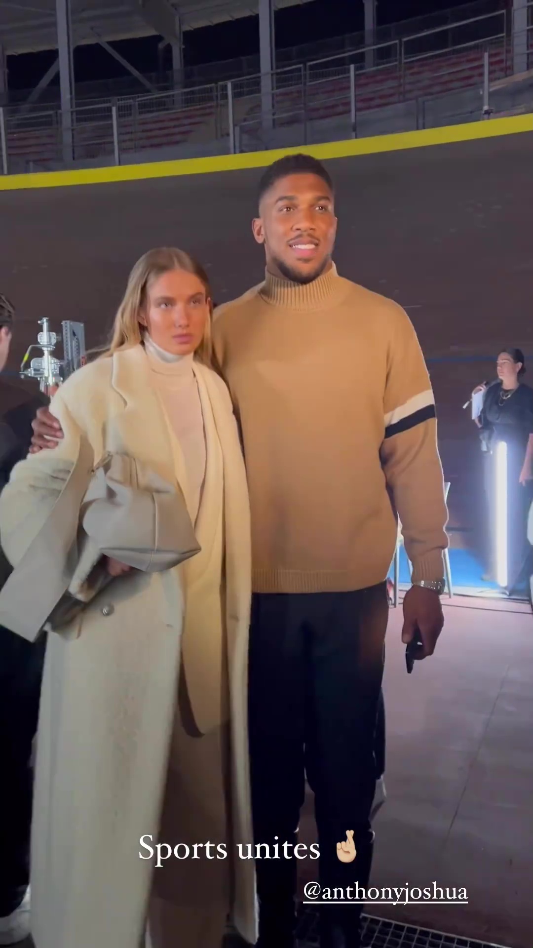 At Milan Fashion Week, Anthony Joshua embraces Alica Schmidt (the 'world's most sexy athlete) and Naomi Campbell